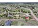 A high angle view of property featuring an equestrian ring and surrounding landscape at 36921 Ruger Ct, Elizabeth, CO 80107