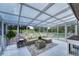 Bright sunroom with skylights, comfortable seating, and views of the outdoors at 36921 Ruger Ct, Elizabeth, CO 80107