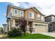 Charming two-story home with a well-maintained lawn and inviting curb appeal at 21271 E Smoky Hill Rd, Centennial, CO 80015
