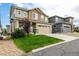 Attractive two-story home featuring a lush green lawn and inviting curb appeal at 21271 E Smoky Hill Rd, Centennial, CO 80015