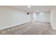 Spacious finished basement with neutral carpeting and recessed lighting at 6196 W 66Th Ave, Arvada, CO 80003