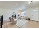 Light and airy living room with contemporary furnishings and hardwood floors at 6196 W 66Th Ave, Arvada, CO 80003