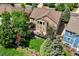 Aerial view of a home showcasing the deck, large backyard, and surrounding landscape at 12000 Pine Top St, Parker, CO 80138