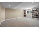 Spacious basement featuring recessed lighting, built-in shelving, and neutral carpet at 12000 Pine Top St, Parker, CO 80138
