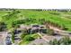 Community clubhouse with ample parking and views of golf course at 12000 Pine Top St, Parker, CO 80138