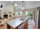 Bright kitchen with stainless appliances, an island and open floor plan at 12000 Pine Top St, Parker, CO 80138