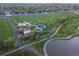 Aerial showcasing community park with playground, green sports fields, and walking trails at 10723 W 54Th Pl, Arvada, CO 80002