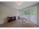 Home office with large windows, offering ample natural light and comfort at 10723 W 54Th Pl, Arvada, CO 80002