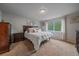 Cozy bedroom featuring a comfortable bed, soft lighting, and neutral decor for a relaxing atmosphere at 10723 W 54Th Pl, Arvada, CO 80002