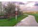 Scenic view of Arvada Bike Loop featuring a wooden fence and lush green landscape at 10723 W 54Th Pl, Arvada, CO 80002