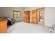 Spacious bedroom with natural light, wood accents, and a peaceful atmosphere at 9868 Overlook Rd, Sedalia, CO 80135