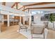 Spacious living room showcases skylights, wood beams and an open layout into the kitchen at 456 Cherry St, Denver, CO 80220