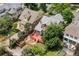Aerial view of a charming home featuring a spacious red deck and a lush, green backyard, perfect for outdoor living at 1020 10Th St, Boulder, CO 80302
