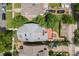 Overhead view of a home with well-maintained landscaping, a vibrant red deck, and a serene backyard space at 1020 10Th St, Boulder, CO 80302