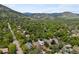 A neighborhood from above, showcasing houses surrounded by lush foliage, offering a serene and picturesque residential setting at 1020 10Th St, Boulder, CO 80302