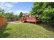 Large backyard with a wooden deck, perfect for relaxing at 1020 10Th St, Boulder, CO 80302