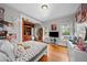 Bedroom with hardwood floors, decor and large windows create a sunny atmosphere at 1020 10Th St, Boulder, CO 80302
