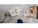 Bright bedroom with sloped ceilings and white decor, creating a calming and airy space at 1020 10Th St, Boulder, CO 80302