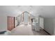 Bright bedroom with white decor, featuring sloped ceilings and a vanity area at 1020 10Th St, Boulder, CO 80302