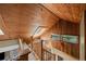 Hallway with wooden ceiling and trim and skylight, and view of the stairs at 1020 10Th St, Boulder, CO 80302