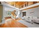 Bright living room featuring hardwood floors and a beautiful staircase at 1020 10Th St, Boulder, CO 80302