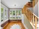 Bright sun room with ample windows offering neighborhood views and featuring brick accents at 1020 10Th St, Boulder, CO 80302