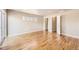 Well-lit bedroom featuring hardwood floors and a double window at 3225 Olive St, Denver, CO 80207