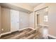 Versatile space with a neutral color scheme and hardwood floors, perfect for an office or den at 3225 Olive St, Denver, CO 80207