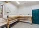 Garage workbench area featuring organized pegboards, and a full length workbench with power at 1653 Gore Dr, Larkspur, CO 80118