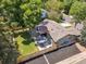 Aerial shot of a home's yard with a patio and a privacy fence at 7092 E Mexico Ave, Denver, CO 80224