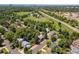 Aerial view of neighborhood with proximity to parks and highways at 7092 E Mexico Ave, Denver, CO 80224