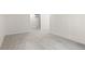 Finished basement space with neutral carpet and trim at 6823 Coors St, Arvada, CO 80004
