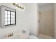 Bathroom featuring a modern vanity, lighting, shower, and neutral color scheme at 6823 Coors St, Arvada, CO 80004