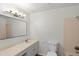 Bathroom featuring a tile shower and a vanity at 6823 Coors St, Arvada, CO 80004