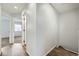 Hallway featuring wood floors and updated paint at 19046 E 57Th Pl # B, Denver, CO 80249