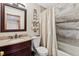 Bathroom with a vanity, neutral color and a combination tub and shower at 24036 Currant Dr, Golden, CO 80401