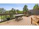 Outdoor deck offering scenic views and a relaxing seating area with beautiful plants at 24036 Currant Dr, Golden, CO 80401