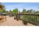 View of deck with seating, grill, and natural light at 24036 Currant Dr, Golden, CO 80401