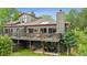 Exterior elevation of home with expansive deck space at 24036 Currant Dr, Golden, CO 80401