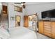 Spacious main bedroom showcasing views to the kitchen, staircase to an upper loft area at 24036 Currant Dr, Golden, CO 80401