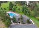 Enjoy the community pool with plenty of space to lounge and large mature trees nearby at 24036 Currant Dr, Golden, CO 80401