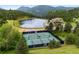 Community offers the use of tennis courts and a beautiful pond, surrounded by mature trees and mountain views at 24036 Currant Dr, Golden, CO 80401