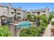 Beautiful community pool area with lush greenery and ample seating, ideal for relaxation and socializing at 3100 S Federal Blvd # 331, Denver, CO 80236
