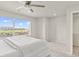 Bright main bedroom with a large window overlooking neighborhood at 762 N Rome St, Aurora, CO 80018