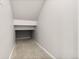 Unfinished storage space featuring neutral colored carpet at 762 N Rome St, Aurora, CO 80018