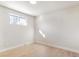 Simple bedroom with light walls and wood-look flooring at 5565 W Arizona Ave, Lakewood, CO 80232