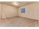The bedroom has neutral carpeting, light walls, and a window for natural light at 250 Upper Forest Rd, Idaho Springs, CO 80452