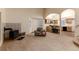 Open-concept living area with fireplace, vaulted ceilings and wood burning stove at 250 Upper Forest Rd, Idaho Springs, CO 80452