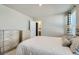 Bedroom features light, neutral tones, creating a calming and inviting space at 529 Beckwourth, Fort Lupton, CO 80621