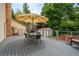 Back deck with seating and a great view of the backyard at 4571 S Memphis St, Aurora, CO 80015